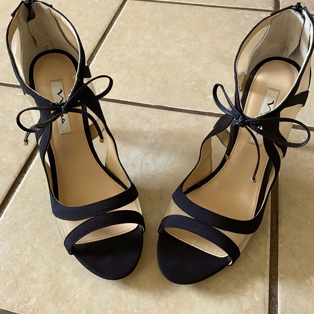 Black heel with sheer opening